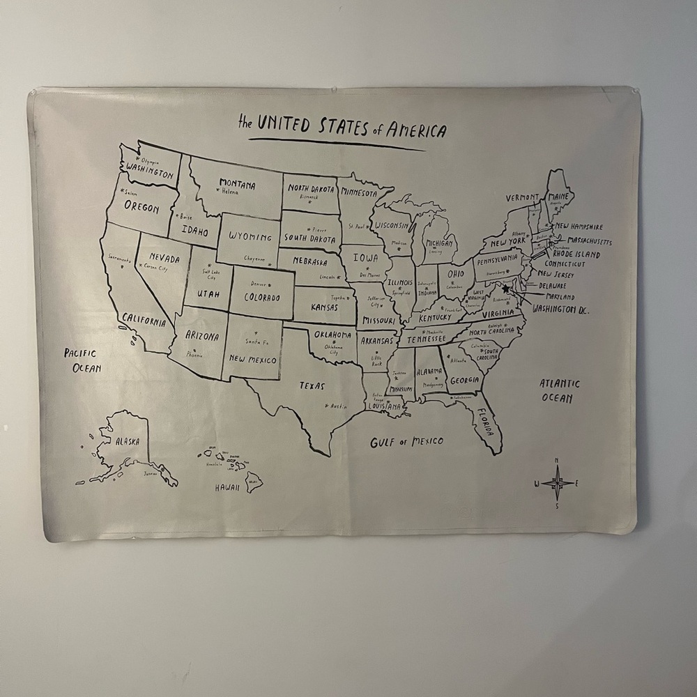 Gray Tapestry Wall Decor featuring a minimalist map of the United States